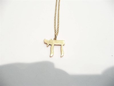 Lot 82 - A Jewish symbol stamped "14K" on a curb link chain and a 9 carat gold fine trace chain