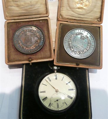 Lot 93 - A silver pocket watch and two medals in fitted boxes