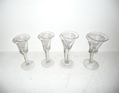 Lot 114 - Pair of spiral twist wine glasses and two plain wine glasses