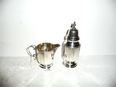 Lot 118 - A silver sugar caster and matching cream jug