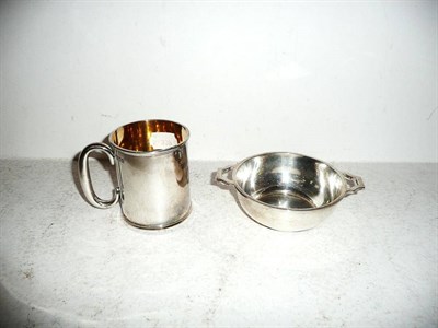 Lot 119 - A silver quaich and a silver mug