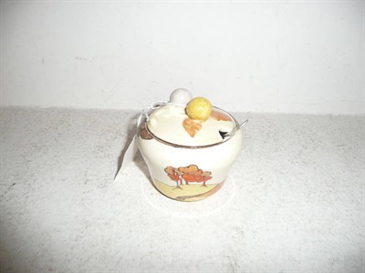 Lot 125 - Clarice Cliff preserve pot