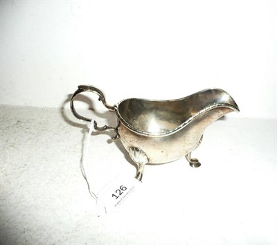 Lot 126 - An 18th century Irish silver sauce boat, Dublin, marks rubbed, (6.97oz.)