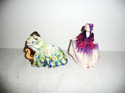 Lot 128 - Two Royal Doulton figures "Sweet Anne" HN1496 and "Solitude" HN2810