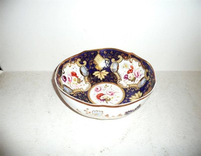 Lot 163 - 19th century porcelain bowl, blue ground and painted with floral sprays