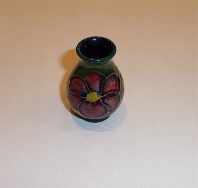 Lot 196 - A Walter Moorcroft Miniature "Clematis" Vase, 2" (5cm)  These miniatures were made from the...