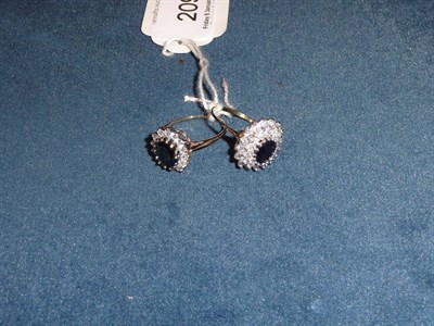 Lot 209 - Two sapphire and cubic zirconia rings