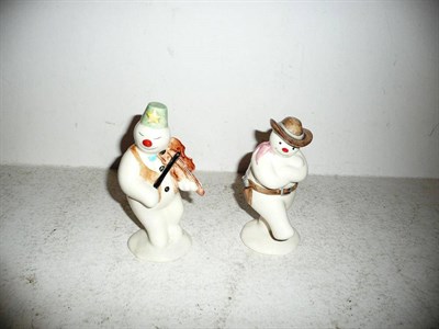 Lot 249 - Two Royal Doulton snowmen figures "Cowboy Snowman" DS6 and "Violinist Snowman" DS11