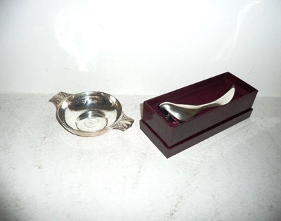 Lot 253 - A silver quaich and a silver and glass Georg Jensen 'bird' paper knife