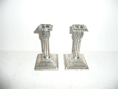 Lot 261 - A pair of loaded silver candlesticks, Sheffield 1900, Jenkins and Timm