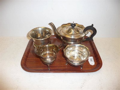 Lot 291 - A silver three piece tea service (approx 15oz), small silver vase, silver teaspoons and a...