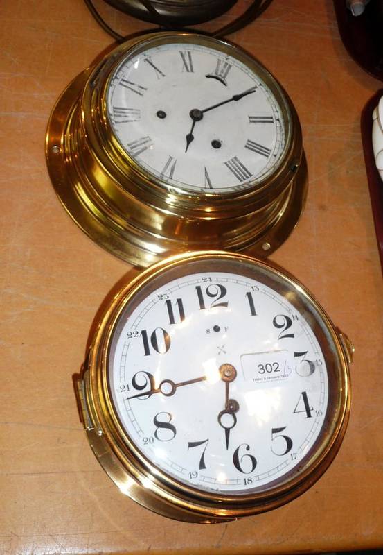 Lot 302 Two brass wall clocks and a small longcase