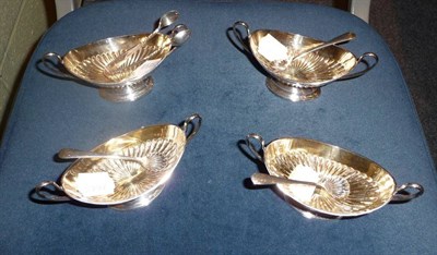 Lot 305 - Set of four two-handled oval salts and spoons