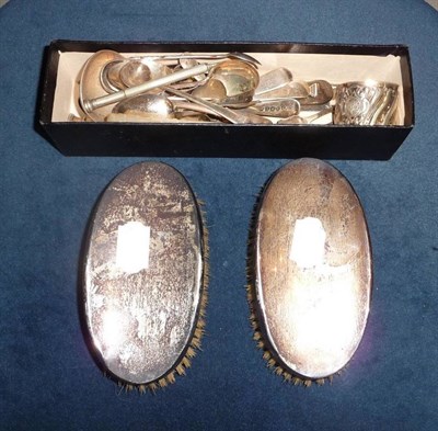 Lot 309 - Quantity of silver teaspoons, napkin ring and two silver brushes