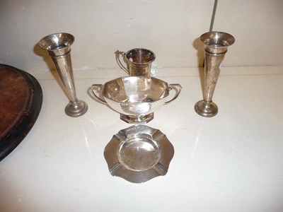 Lot 312 - Silver including a pair of posy vases, two handled sugar basin, ashtray and a small mug