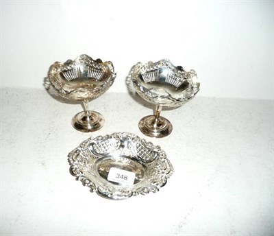 Lot 348 - A pair of silver bon bon dishes, Birmingham 1913 and an oval dish, London assay