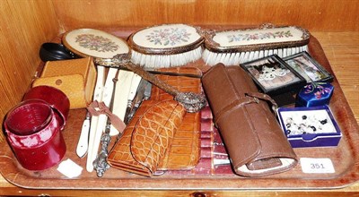 Lot 351 - Tray including Petit point dressing table pieces, ivory glove stretchers, silver handled button...