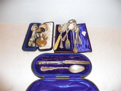 Lot 376 - Silver including cased spoon and fork, cased spoon, knife and spoon, two napkin rings, butter...