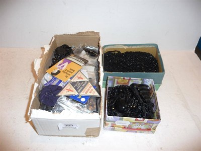 Lot 385 - Three boxes of jet and black beads, etc