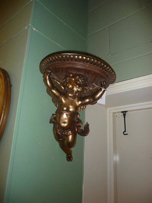 Lot 458 - Gilt cherub wall bracket