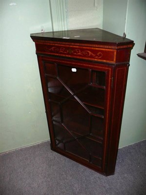 Lot 485 - An Edwardian Sheraton-revival mahogany corner cabinet