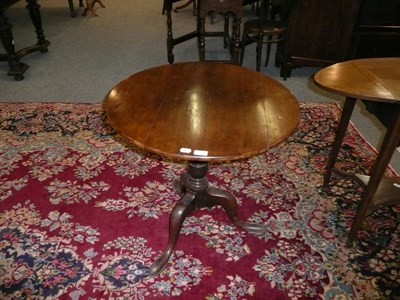 Lot 510 - George III mahogany tilt top table with tripod base (associated top)