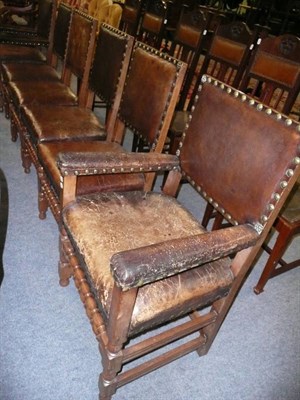 Lot 526 - Six leather upholstered dining chairs