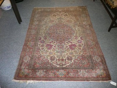 Lot 538 - An Isfahan rug the field of scrollin vines around a cusped medallion