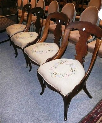 Lot 543 - A set of four 19th century oak spoon back chairs