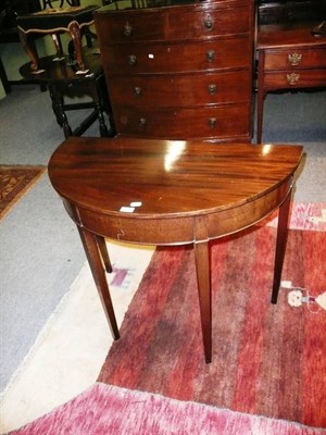 Lot 556 - George III mahogany demi lune table