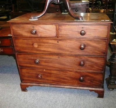 Lot 563 - George III mahogany chest of two short and three long drawers