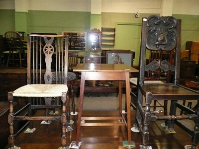 Lot 566 - An Edwardian occasional table, bedroom chair, rush-seated dining chair and a carved oak hall chair