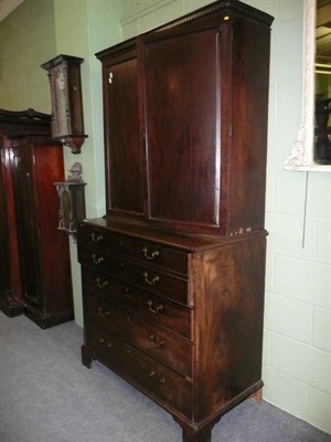 Lot 595 - A George III mahogany secretaire bookcase