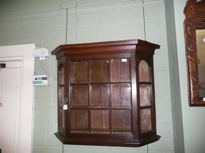 Lot 605 - An 18th century Dutch oak hanging display case and key