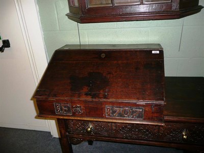 Lot 606 - 18th century oak writing slope dated 1707