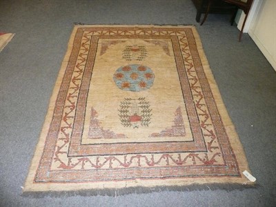 Lot 608 - A Khoton design Rug the camel field centred by a roundel medallion.