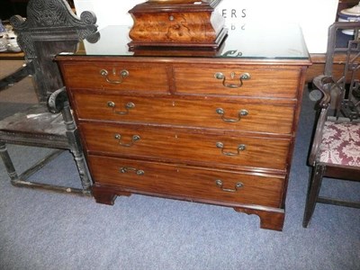 Lot 625 - Late George III mahogany four height chest