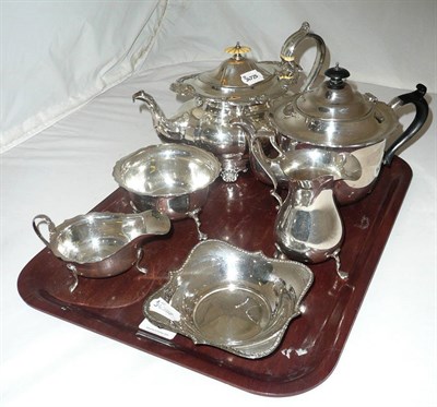 Lot 6 - Three piece silver tea service, silver sauce boat, pair of plated dishes and a plated teapot