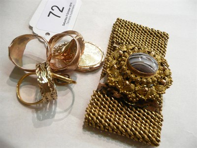 Lot 72 - Six 9ct gold rings, a locket stamped 9ct and a gilt metal bracelet