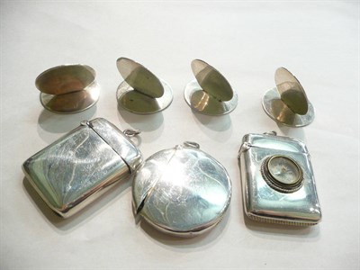 Lot 79 - Set of four silver menu/place markers and three assorted vestas