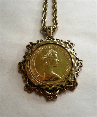 Lot 110 - A 1973 full sovereign in a pendant mount on a 9ct gold chain