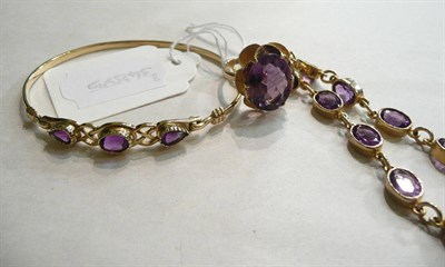 Lot 116 - A 9ct gold amethyst ring, an amethyst bangle and an amethyst bracelet