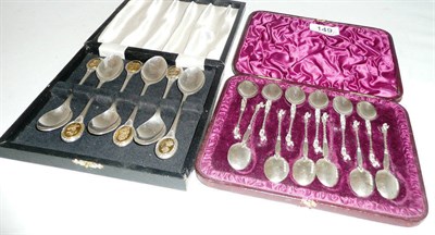 Lot 149 - A cased set of twelve silver apostle style teaspoons and a cased set of six silver teaspoons...