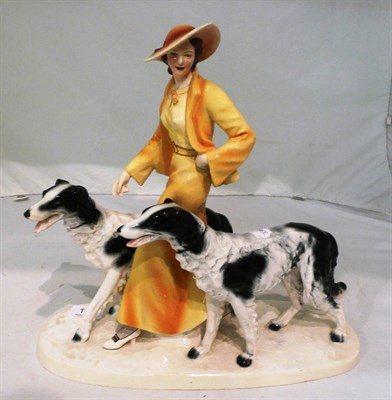 Lot 161 - An Art Deco figure of a lady and dogs (a.f.)