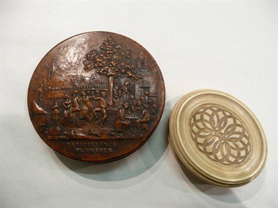 Lot 257 - Pressed burr walnut circular snuff box and cover 'Rejouissance Flamande' and an oval carved...