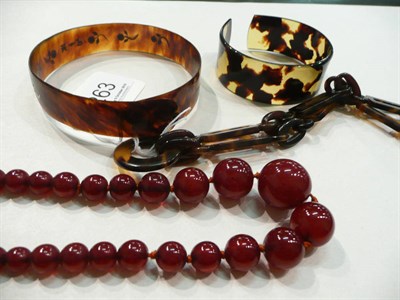 Lot 263 - Amber beads and tortoiseshell jewellery