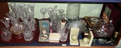 Lot 282 - Shelf including Stuart crystal champagnes, cut glass water jugs and bowls, canteen of plated...