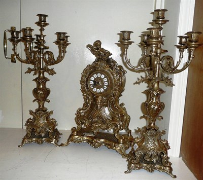 Lot 286 - Gilt metal triple clock garniture in 19th century French style