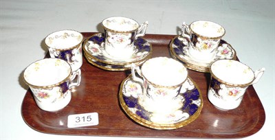 Lot 315 - A set of six Coalport coffee cups and saucers