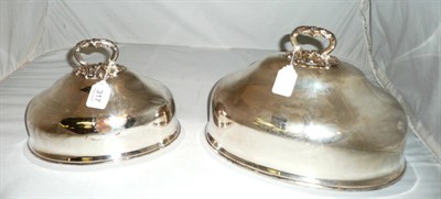 Lot 317 - Two Sheffield plate meat covers (2)